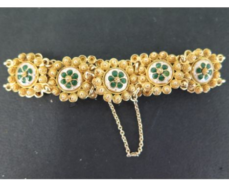 A 22ct gold and enamel filigree panel bracelet - With foreign marks - Length 18cms - Weight approx 17.1gms
Condition Report: 