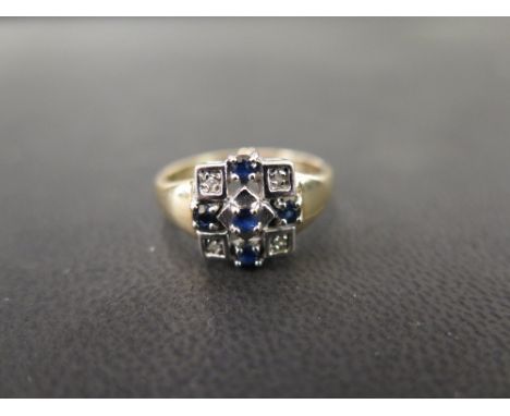 A 9ct gold sapphire and diamond panel ring - Hallmarked London - Ring size O - Weight approx 3.1gms
Condition Report: Good - 