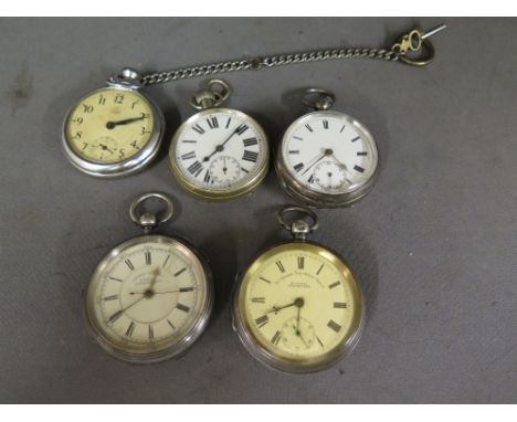 A lot of five pocket watches, three with silver cases, one with white enamel face - some cracking - marked centre seconds 126