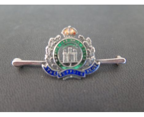 The Suffolk Regiment, an enamel sweetheart brooch - Stamped 9ct - Length 4.5cms - Weight approx 4.2gms
Condition Report: Good