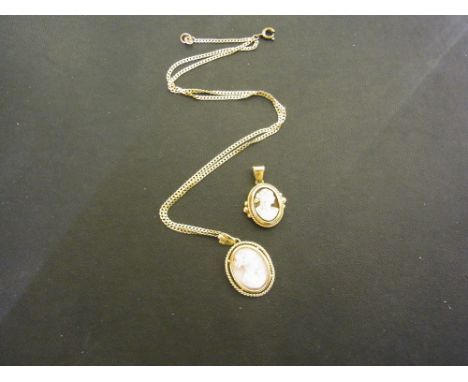 Two shell cameo pendants - Each within a rope-twist surround - One suspended from a curb-link chain - Test as 9ct gold - Leng