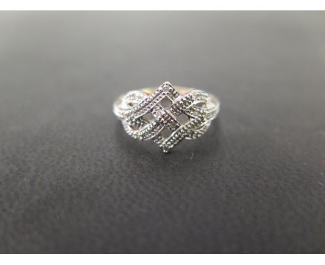 A 9ct gold diamond lattice-style dress ring - Hallmarked Sheffield - Ring size L - Weight approx 2.3gms
Condition Report: Goo