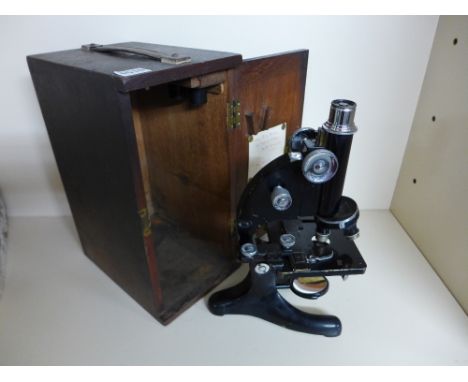 An R and J Beck microscope and case