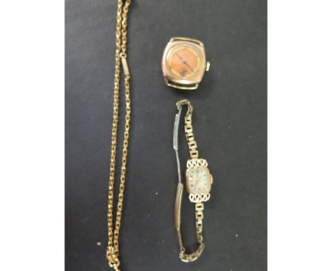 A Ladies 18 ct gold Tudor wristwatch with silvered face and baton markers on a rolled gold strap - Weight approx. 2.5 grms - 