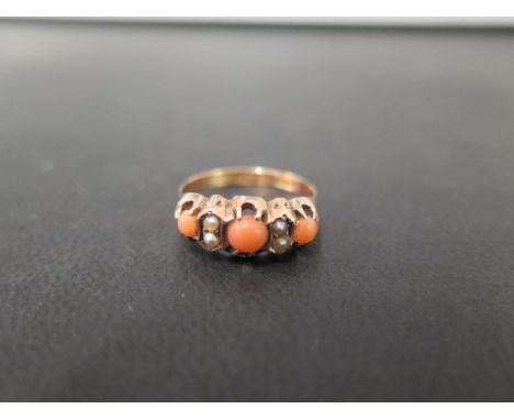 A late Victorian 9ct gold coral and seed pearl ring - Hallmarked Birmingham 1891 - Ring size M 1/2 - Weight approx 1.5gms
Con