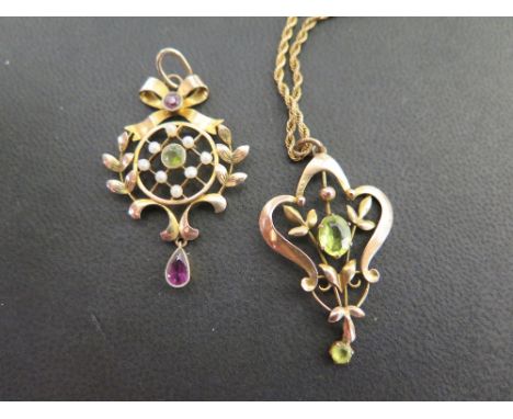 An early 20th century 9ct gold seed pearl, peridot and garnet openwork pendant - Length 4cms - Weight approx 2.8gms -Together