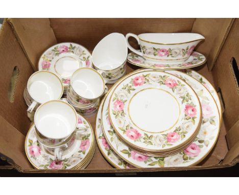 A Royal Worcester 'Royal Garden' part dinner and tea service Comprising of dinner plates, side plates, saucers and tea cups, 