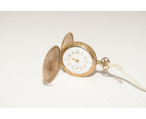 A gold plated hunter pocket watchThe circular white enamel dial with Arabic hour and minute markers, and subsidiary seconds d