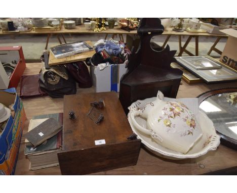 An Ecclesiastical oak TabernacleAlong with a mahogany corner cupboard and a ceramic wash bowl and jug, with two books. 