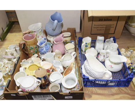 A large collection of various ceramic jugsIncluding studio pottery examples, colourful examples, etc. 