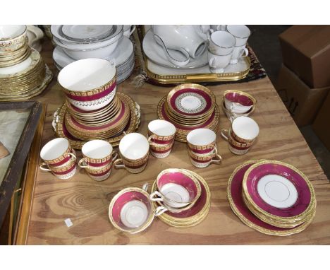 A Davenport Longport tea set Decorated in pink and gilt, comprising of twelve tea cups, sandwich plates, side plates, etc, to