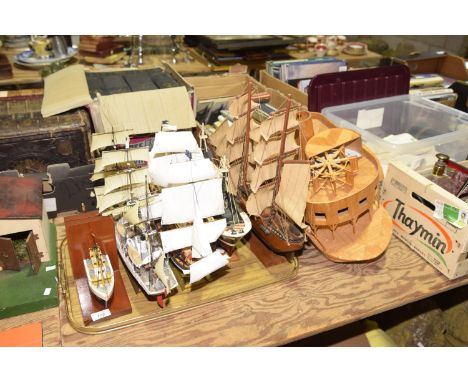 A collection of various model ships Including two ship book ends, a masted galleon, and a match stick example. (6) 