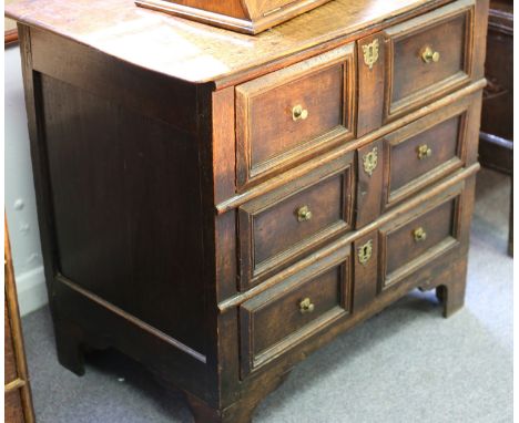 An 18th Century oak chest of three drawers on bracket feet, 89cm wide