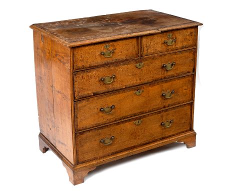 An oak and walnut crossbanded chest of two short and three long drawers, on bracket feet, 94cm wide