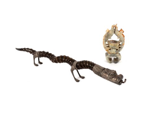 A table lighter in the form of a dragon and a soapstone vase