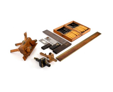A sash fillister, three squares, two mitre squares and a box of chisels etc