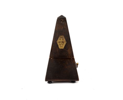 A metronome by Maelzel, 23.5cm high