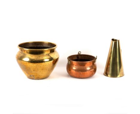 A brass megaphone, 31cm high, a hanging copper jardinière and a brass jardiniere