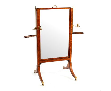 A Regency mahogany cheval glass with sash type rectangular glass, candle branches and trinket trays on splay feet, 140cm high