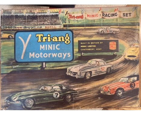 Triang: A boxed Triang Minic Motorway set M.1522 containing Mercedes and Porsche cars. 1950/60. Incomplete. Additional track 