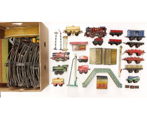 Hornby: A collection of assorted Hornby O Gauge to include: three locomotives, various rolling stock, accessories and track. 