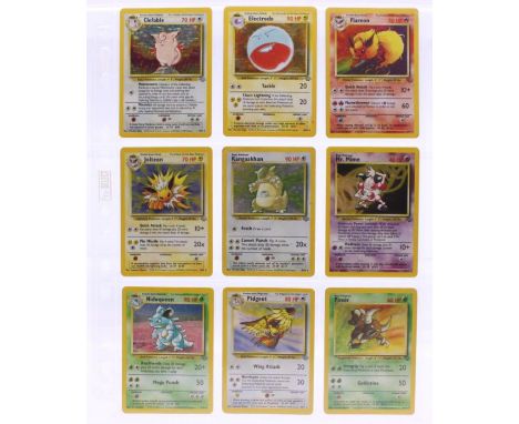 Pokemon: A complete Pokemon Unlimited Jungle set, comprising 64 cards. Some whitening to card edges, some small marks to card