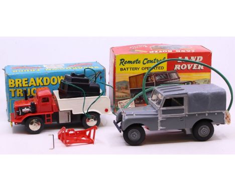 Marx: A boxed Marx Toys, Land Rover, battery operated remote control, grey livery; together with a boxed Codeg Toys, Breakdow