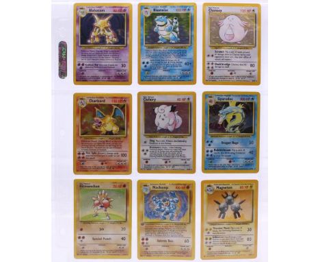 Pokemon: A complete Pokemon Unlimited Base Set, comprising 102 cards. To include the 'standard' 1st Edition Holo Machamp (8/1