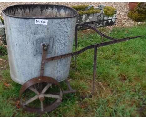 A late Victorian wrought iron and galvanised water bowser, 114 cm long x 80.5 cm high overall