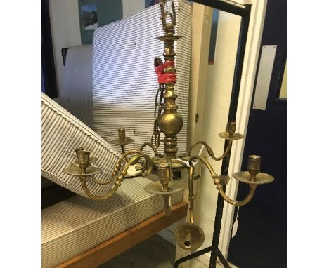 A 19th Century gilt brass eight branch chandelier in the Continental style