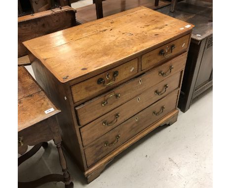 A George III fruitwood chest of two short and three long graduated drawers on bracket feet, 89 cm wide x 83 cm high x 49 cm d