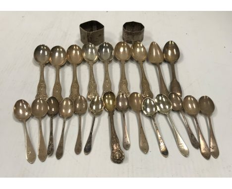 A collection of various silver teaspoons and two napkin rings, approx 16 oz
