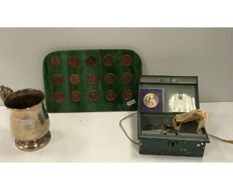 A silver tankard of baluster form engraved "Presented to Jack Cook from the Directors of Toveys of Cirencester in Appreciatio