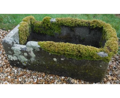 A rectangular natural stone trough with shallow D end, 86 cm x 50 cm CONDITION REPORTS there are no holes in the base of this