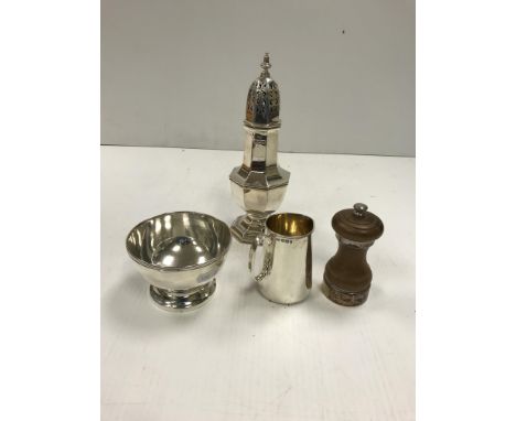A collection of silver wares comprising an octagonal faceted baluster shaped sugar caster, a straight sided silver cream jug,