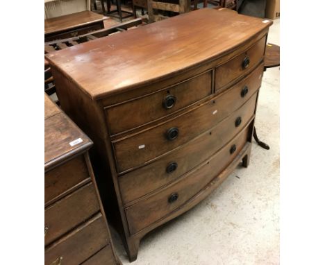 A Victorian mahogany bow front chest of two short over three long graduated drawers on bracket feet, 103 cm wide x 104 cm hig