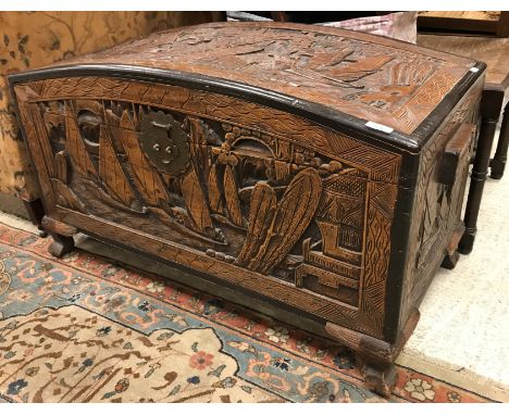 A collection of furniture comprising a carved trunk, three 19th Century chairs, an oak four tier bookcase, two upholstered fo