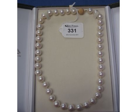 Necklace of large cultured pearls with 14ct gold clasp, in box.(B.P. 24% incl. VAT)   CONDITION REPORT:  pearl size - 1cm dia