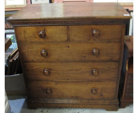 19th Century oak straight fronted chest of two short and three long drawers, with turned handles, on bracket feet.(B.P. 24% i