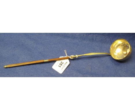 Silver toddy ladle with wooden handle.(B.P. 24% incl. VAT)