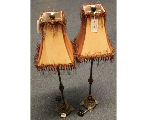 Pair of tall classically styled table lamps with ceramic balusters and tasseled fabric shades.  Modern.  (2)(B.P. 24% incl. V