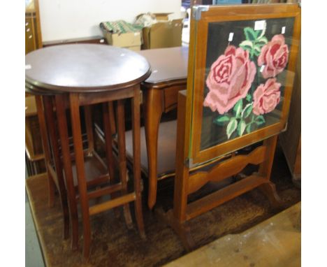 Nest of three mahogany oval tables, together with a tapestry fire screen/folding table. (2)(B.P. 24% incl. VAT)