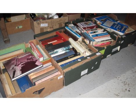 Four trays of assorted books, various, to include: paperbacks; Michelin 'Great Britain and Ireland Maps'; 'First Aid Manual';