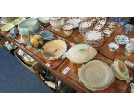 Three trays of assorted china to include: Art Deco design wall mask; Beswick ware two section snack tray; Clarice Cliff fruit