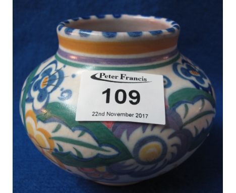 Carter, Stabler & Adams Poole pottery baluster shaped vase, overall with a band of painted floral decoration and having terra