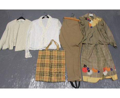 Vintage clothing (70's-80's) to include: a silky floral printed skirt suit by Serge Nancel Paris, vintage light wool jodhpurs