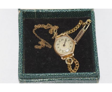 Vintage CYMA watch in 9ct Hantily case together with a fine 9ct piece of chain weight: approx 1.24 grams