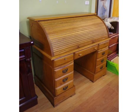 Oak roll top desk and chair the pedestal desk with drawers and pull out shelves, 124cm wide, 66cm deep, 119cm high