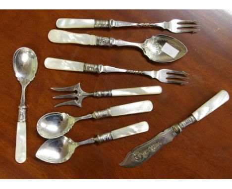 Sterling silver&mother of pearl bread/serving fork together with seven assorted silver plate and mother of pearl condiment cu