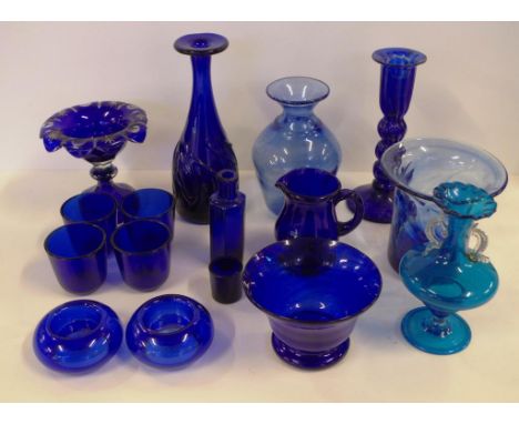 Collection of vintage blue glass items to include candle holders, bowl, comport, salt insert, cups and vases
